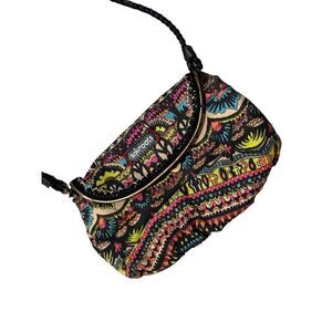 Nice women Sakroots PEACE multicolored crossbody purse with black braided strap.